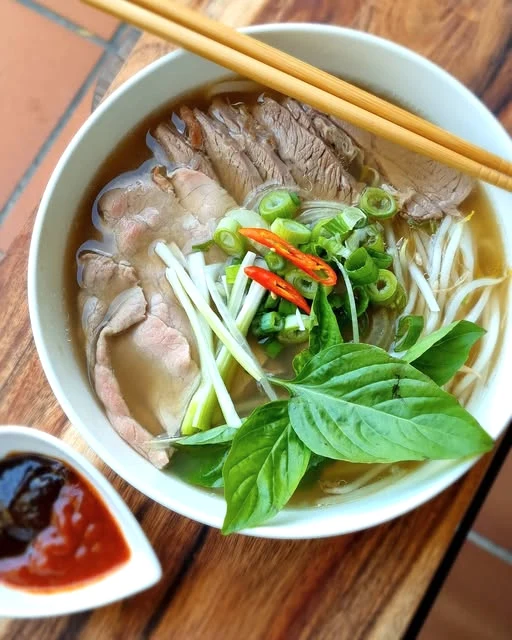 Cafe B’Loc beef phở with rice noodles and fresh herbs